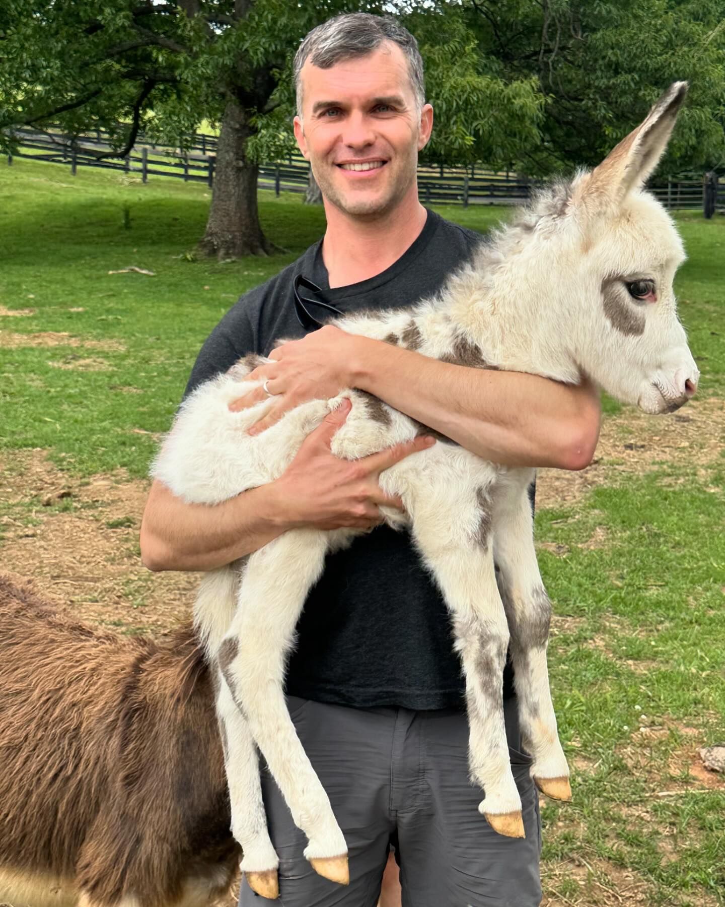Elliott Garber holding donkey
