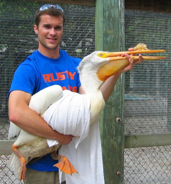 Elliott Garber holding pelican